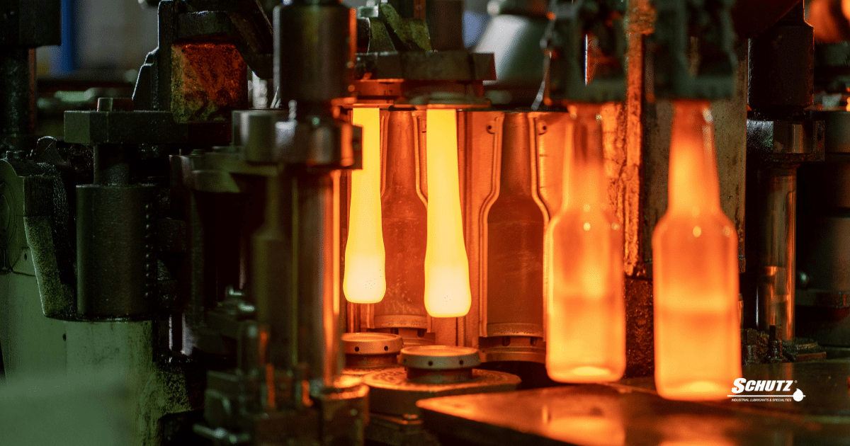 Aplicación de lubricante en máquina IS